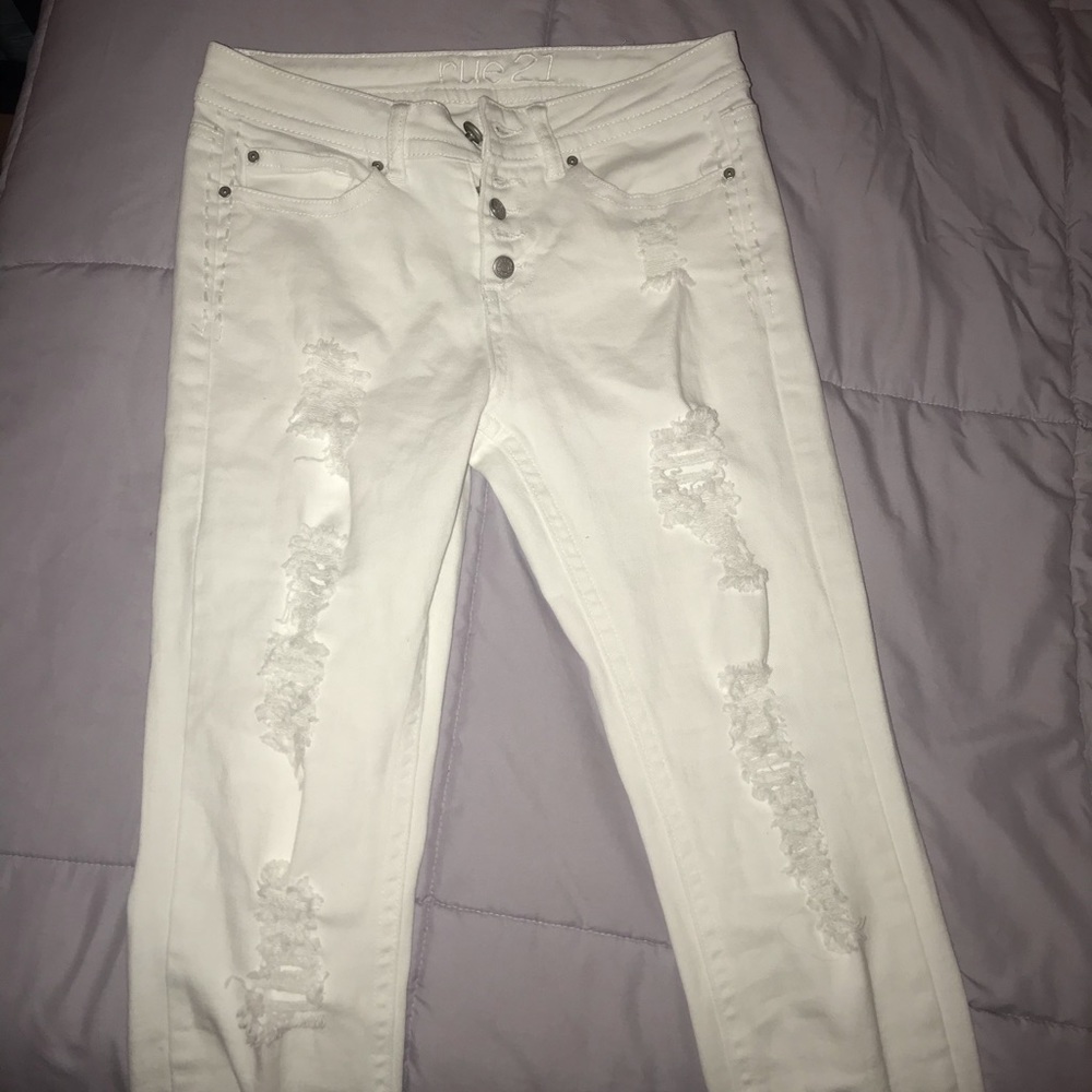 white ripped button up jeans